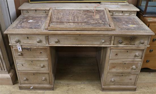 A pine pedestal desk W.138cm